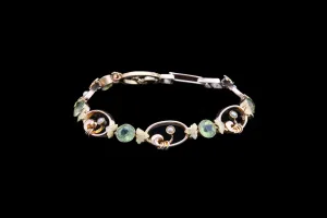 Art Nouveau 15ct Yellow Gold Peridot and Seed Pearl Decorative Bracelet