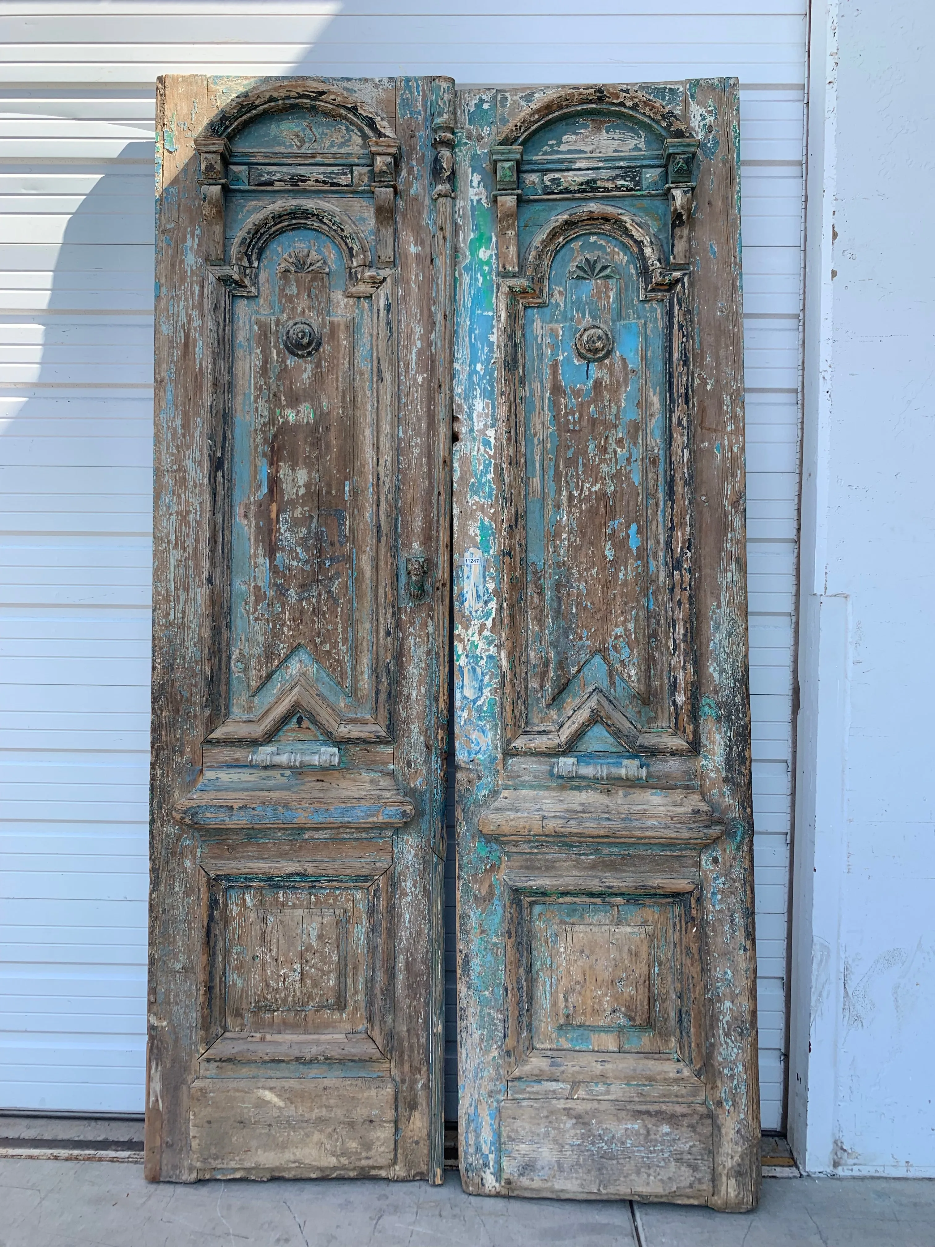 Pair of Ornate Antique Wood Carved Doors