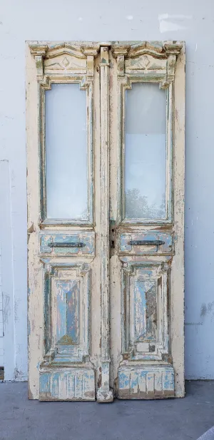 Pair of Ornate Wood 4 Panel Carved Antique Doors with Glass Half Lite