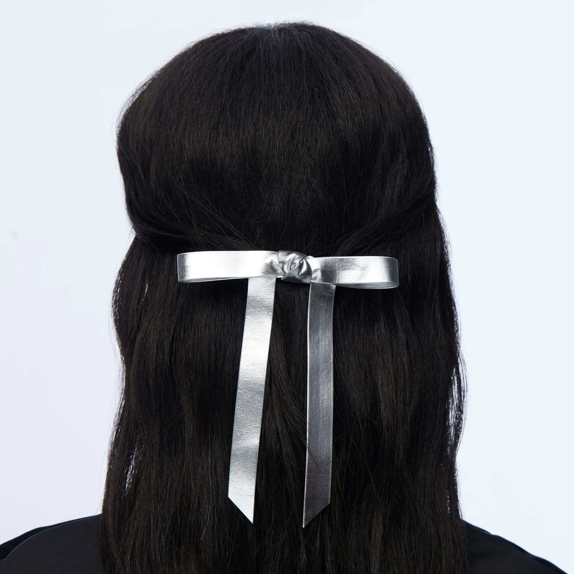 SILVER BARDOT FAUX LEATHER BOW BARRETTE